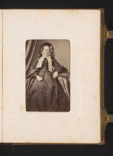 Portrait of a Woman with a Cap, Seated at a Table