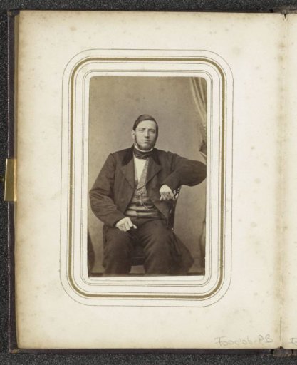 Portrait of a seated man with a beard and a neckerchief