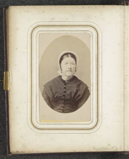 Portrait of a woman with a lace cap and a necklace