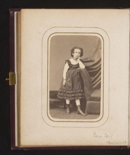 Portrait of a girl, leaning on the back of a chair