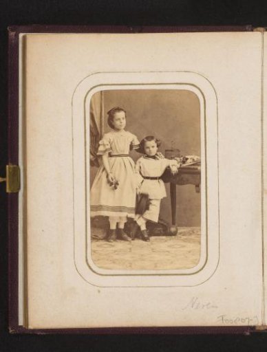 Portrait of a standing girl and a standing boy