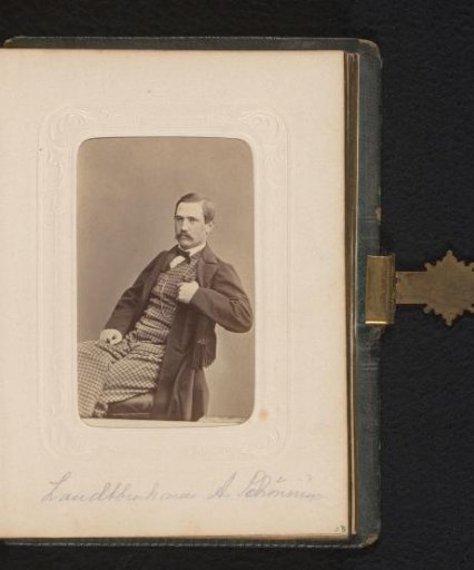 Portrait of a seated man, identified as Axel Schönning