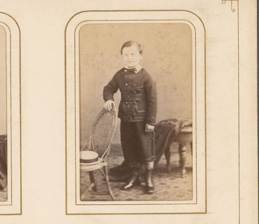 Portrait of a Boy, Standing by a Chair with a Hat