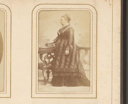 Portrait of a Woman, Standing by a Chair with Her Hand on a Book, Labeled as Mme Berlier