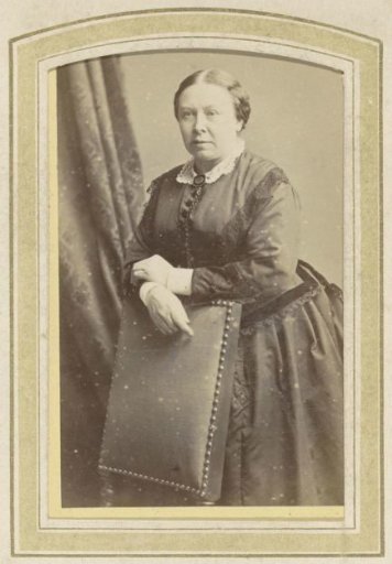 Portrait of a Woman in a Dress Leaning on a Chair