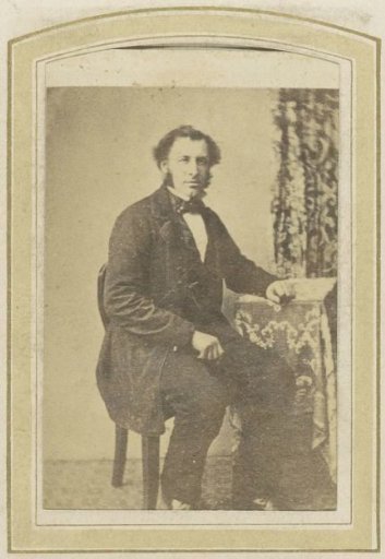 Portrait of a Seated Man at a Table