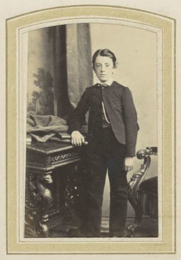 Portrait of a Young Man at a Table with Books