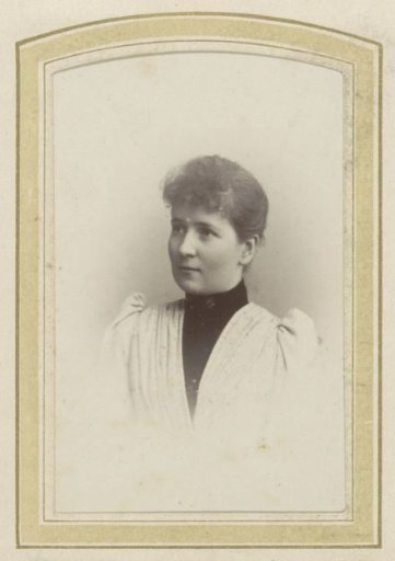 Portrait of a young woman with a collar and a pleated dress