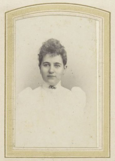 Portrait of a young woman with a necklace