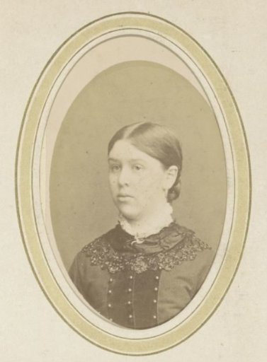 Portrait of a young woman with a decorated collar