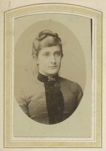 Portrait of a Woman with Updo Hair and Brooches