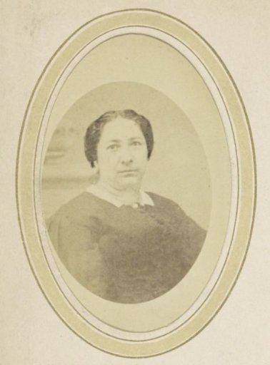 Portrait of a woman with her hair up and a white collar