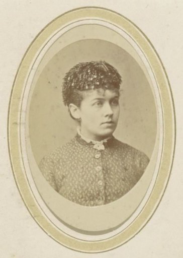 Portrait of a young woman with a beaded headdress