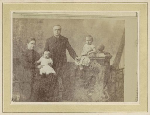 Portrait of a man, a woman, and two children
