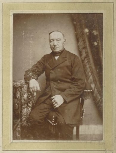 Portrait of a man in a coat