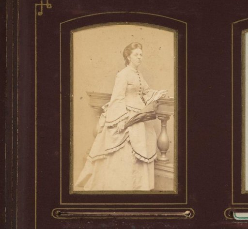 Portrait of a Woman at a Balustrade Holding an Umbrella