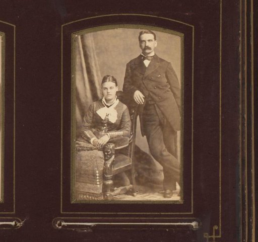 Portrait of a seated woman and a standing man