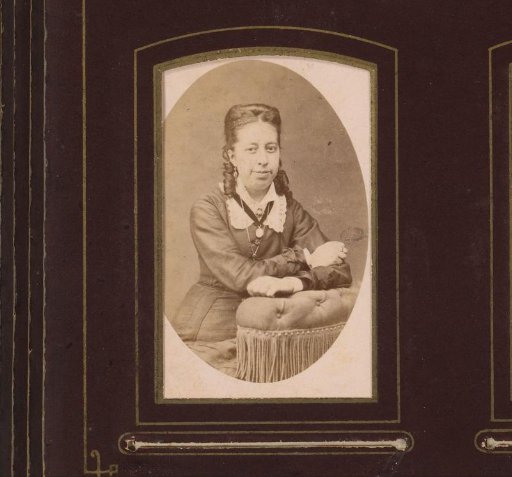 Portrait of a Young Woman with Ringlet Curls, Leaning on a Chair