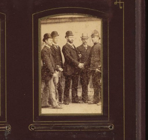 Portrait of five men, one of whom a policeman