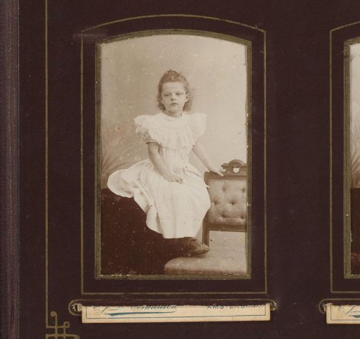Portrait of a seated girl, with her feet on a chair