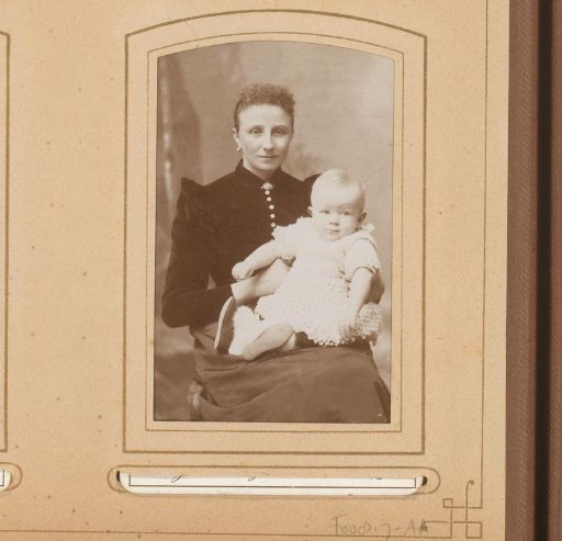 Portrait of a mother with a baby on her lap