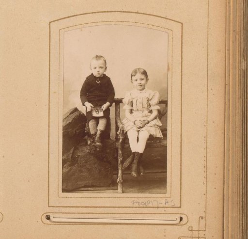 Studio Portrait of a Seated Boy and Girl