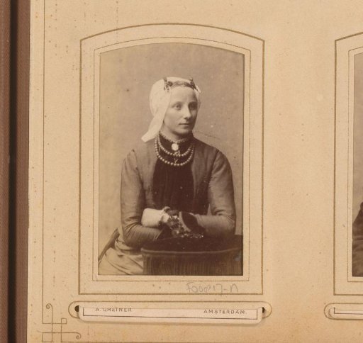 Portrait of a woman with a white cap