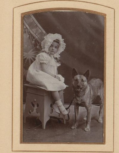Portrait of a Seated Girl with a Dog