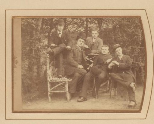 Group portrait with five young men with hats and walking sticks