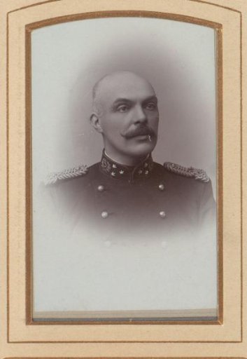 Portrait of a man with a mustache in uniform