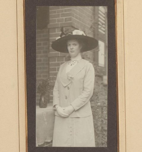 Portrait of a Woman with Hat and White Gloves