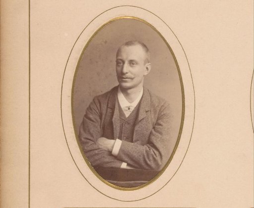 Portrait of a man leaning on a chair