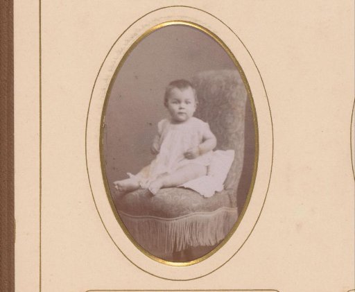 Portrait of a baby on an armchair