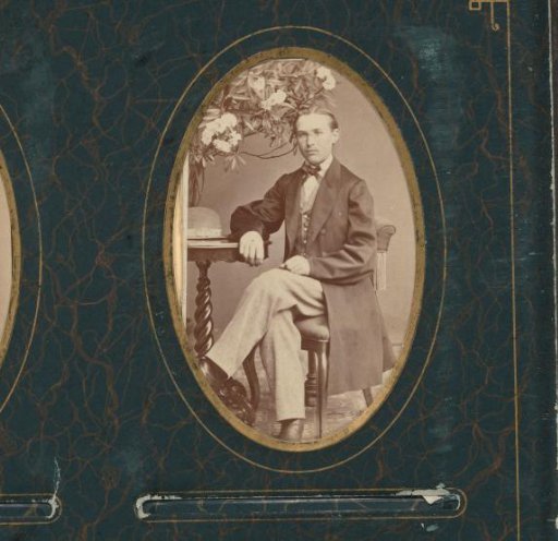 Portrait of a Young Man, Seated at a Table