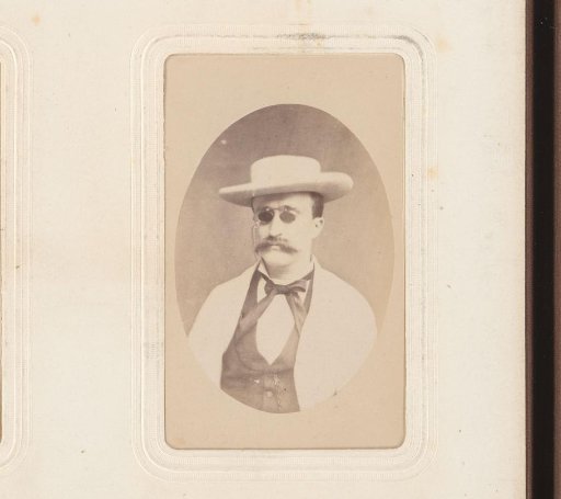 Portrait of a man with a hat and sunglasses