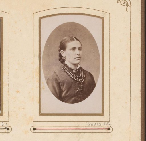 Portrait of a woman with a necklace with a cross