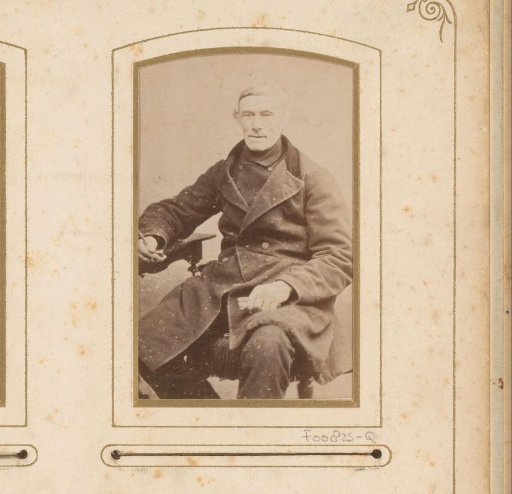 Portrait of a seated man with a pipe in his hand