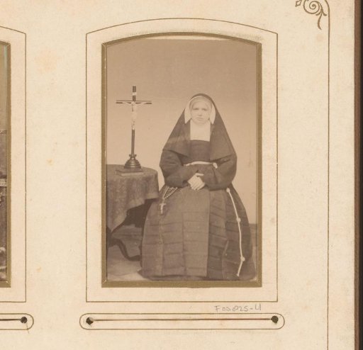 Portrait of a seated nun