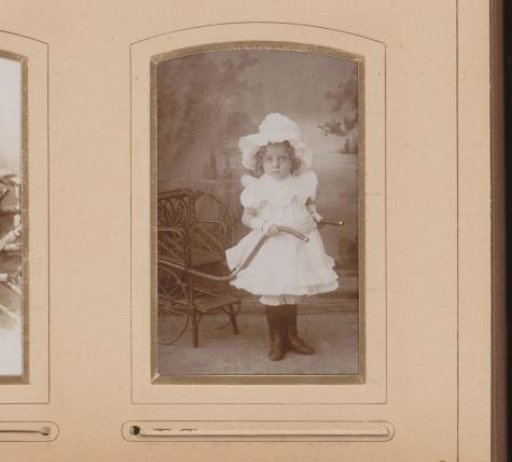 Portrait of a Standing Girl in a White Dress