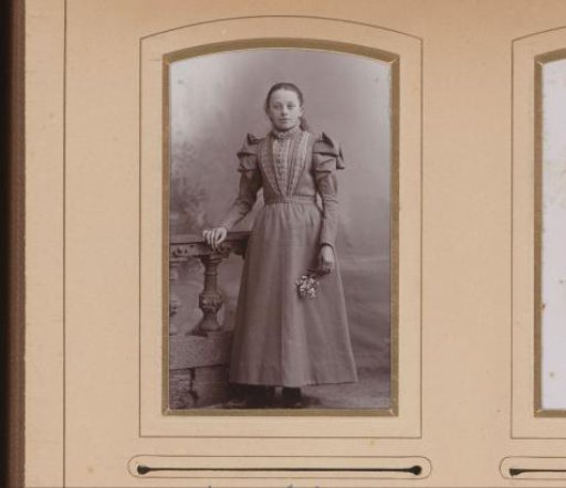 Portrait of a Girl Standing by a Balustrade