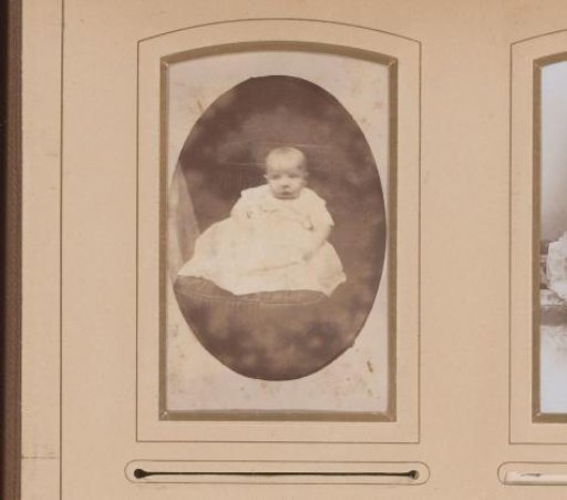 Portrait of a sitting baby, identified as Wim