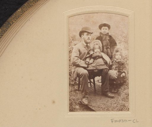 Portrait of a man, a young woman and two children