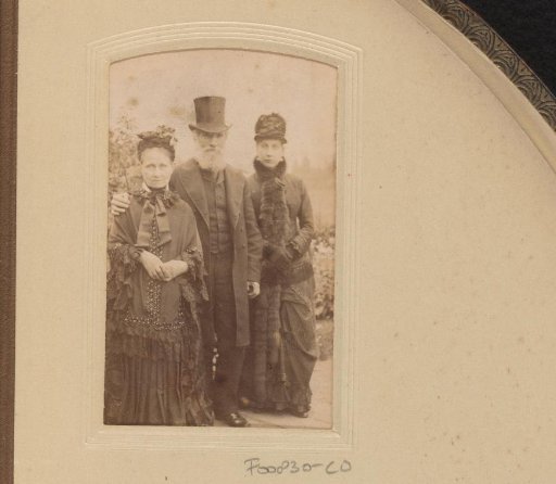 Portrait of a man and two women