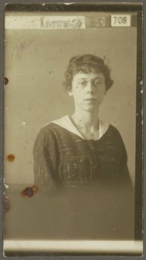 Portrait of a woman with short hair and a white collar