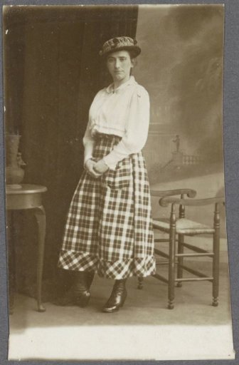Portrait of a woman in a checkered skirt