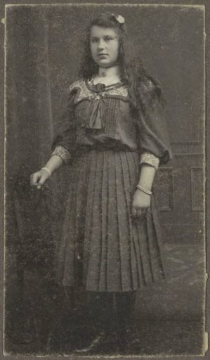 Portrait of a girl in a three-quarter dress