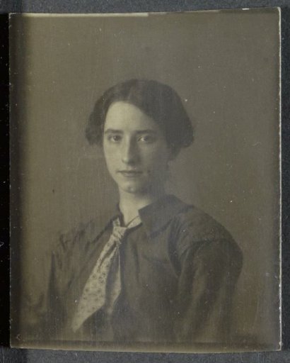Portrait of a woman with her hair tied up