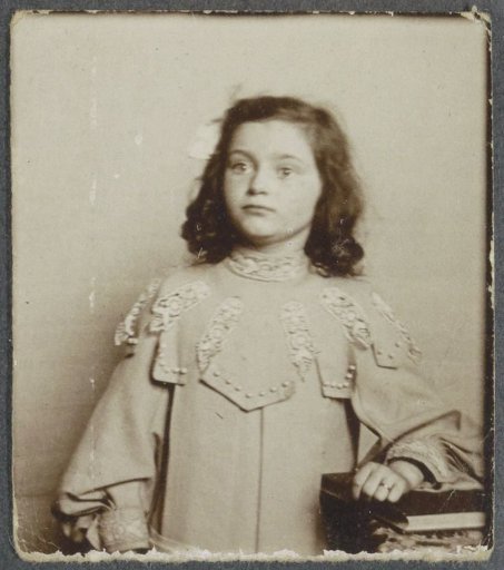 Portrait of a young girl in a dress