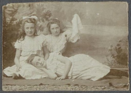 Group portrait of three girls, possibly sisters