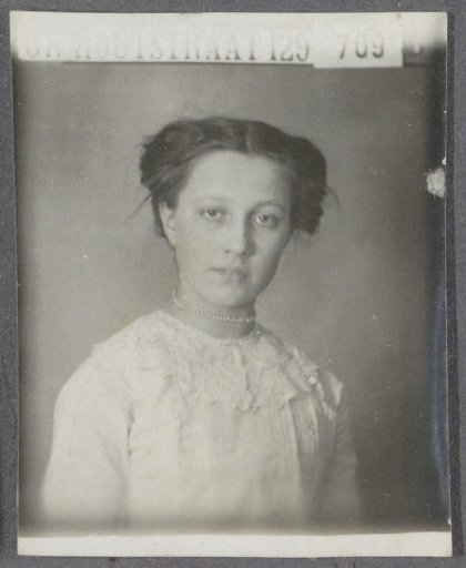 Portrait of a woman with her hair tied up